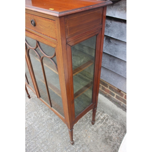 570 - An Edwardian walnut, satinwood banded and line inlaid ledge back display cabinet, fitted two drawers... 