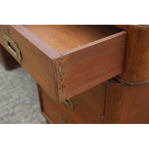 589 - A 1930s walnut double pedestal desk, fitted with military style handles, drawers and blue tooled lea... 