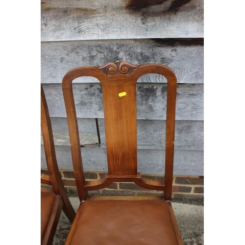 604 - An early 20th century walnut oval extending dining table with extra leaf, 70