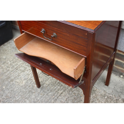 609 - A 1930s mahogany three-drawer music cabinet, 19