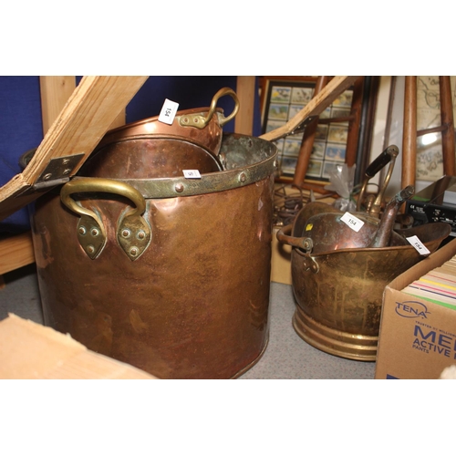 154 - A copper and brass handled pot, 14