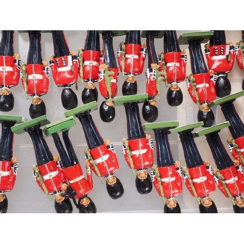 227 - Approximately 100 painted lead figures, including Queen's Guards, Beefeaters, Scots Guards, etc, in ... 