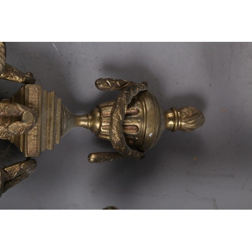 287 - A set of four tooled brass two-light wall brackets of 17th century design, 15