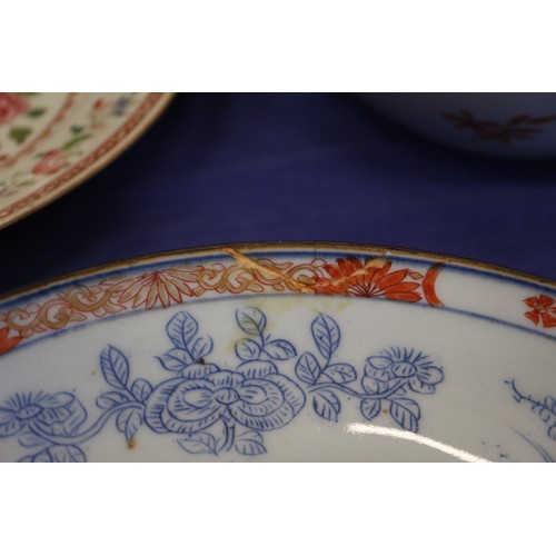 120 - A pair of Chinese famille rose and exotic bird decorated plates, 9