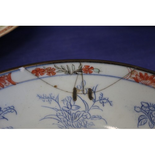 120 - A pair of Chinese famille rose and exotic bird decorated plates, 9