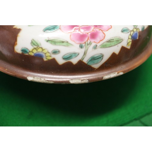 89 - A Chinese polychrome floral decorated plate, 9