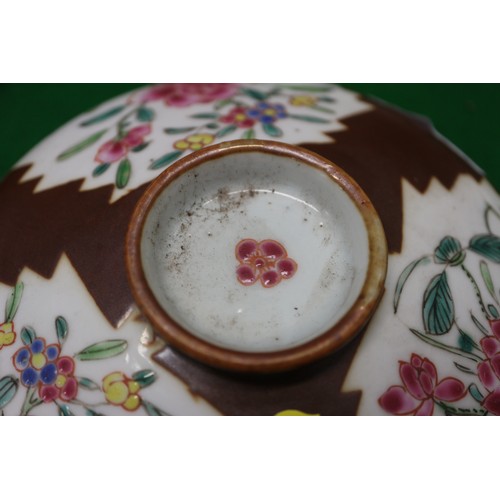 89 - A Chinese polychrome floral decorated plate, 9