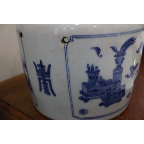 96 - A Chinese blue and white jar, decorated panels with precious objects and a landscape with figures, 6... 