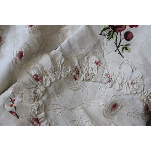 250 - A mid 18th century self-coloured and embroidered silk 