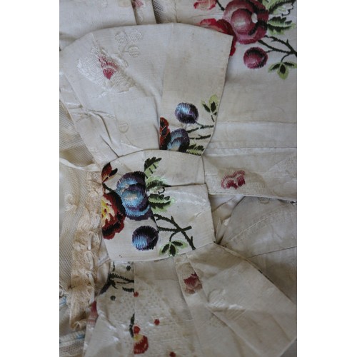 250 - A mid 18th century self-coloured and embroidered silk 