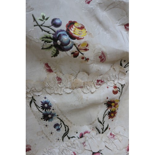 250 - A mid 18th century self-coloured and embroidered silk 