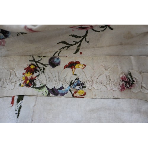 250 - A mid 18th century self-coloured and embroidered silk 