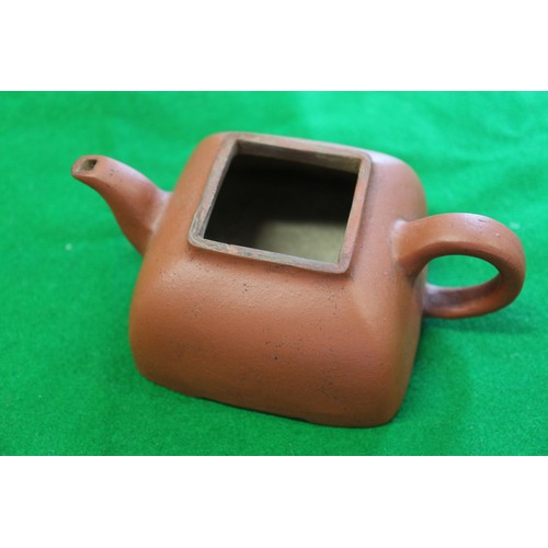 104 - A Chinese Yixing square-section teapot with seal mark to base, 3