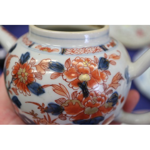 121 - An Imari decorated globular teapot and cover (chips to cover), 5