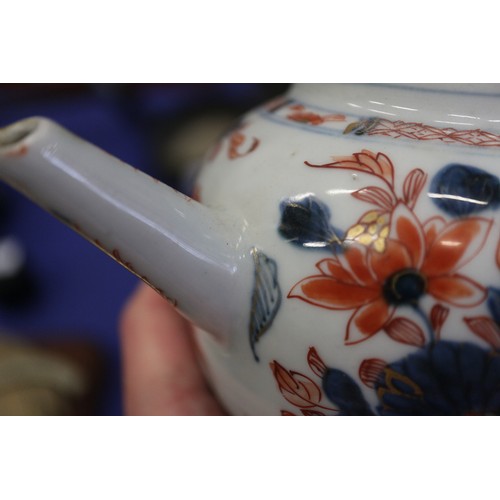 121 - An Imari decorated globular teapot and cover (chips to cover), 5