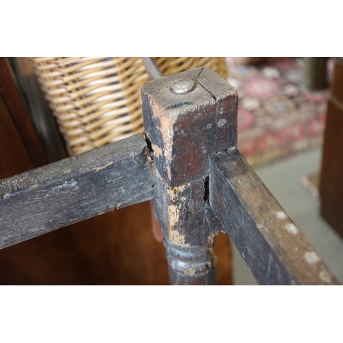 512 - A largely 17th century oak joint stool, on turned and stretchered supports, 18