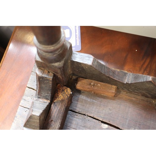 512 - A largely 17th century oak joint stool, on turned and stretchered supports, 18