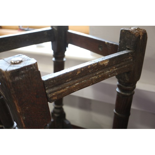 512 - A largely 17th century oak joint stool, on turned and stretchered supports, 18