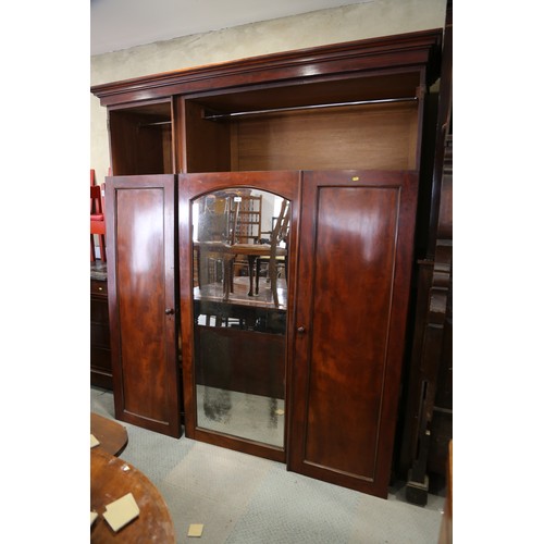 530 - A Holland and Sons 19th century figured mahogany linen press/wardrobe enclosed mirror door and two p... 