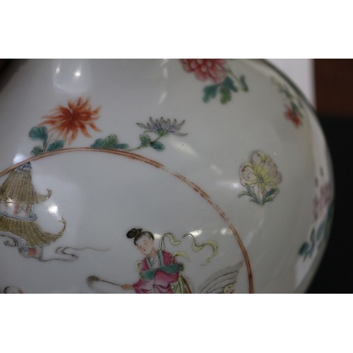 83 - A Chinese porcelain bulbous vase with enamelled panels of figures in landscapes on a floral strewn g... 