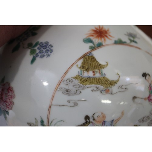 83 - A Chinese porcelain bulbous vase with enamelled panels of figures in landscapes on a floral strewn g... 