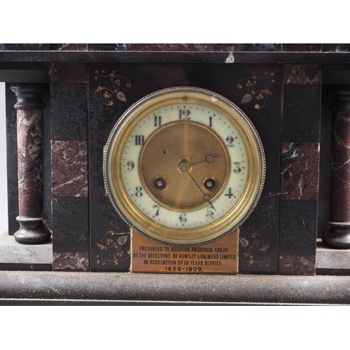 100 - An early 20th century slate and marble cased mantel clock, 13