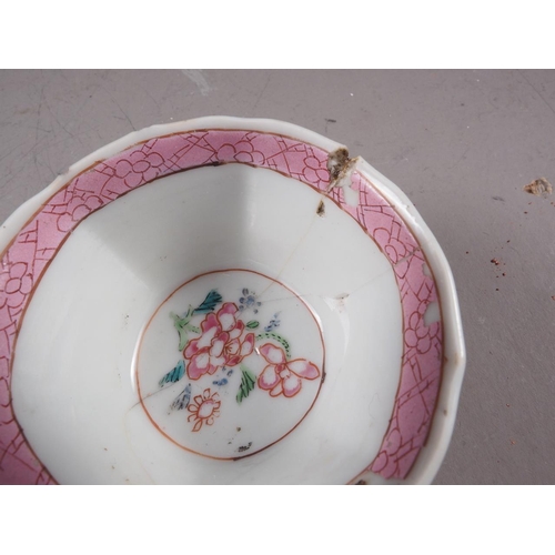 69 - Four Chinese tea bowls, a Canton teacup, a pair of blanc de Chine Dogs of Fo, 8