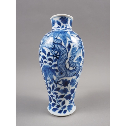 81 - A Chinese blue and white baluster vase with dragon and flower decoration and six-character mark to b... 