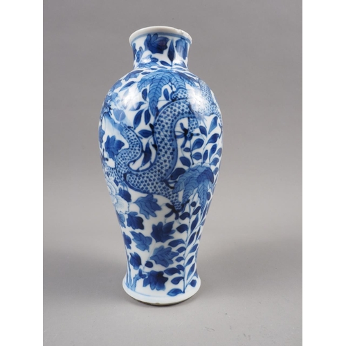 81 - A Chinese blue and white baluster vase with dragon and flower decoration and six-character mark to b... 