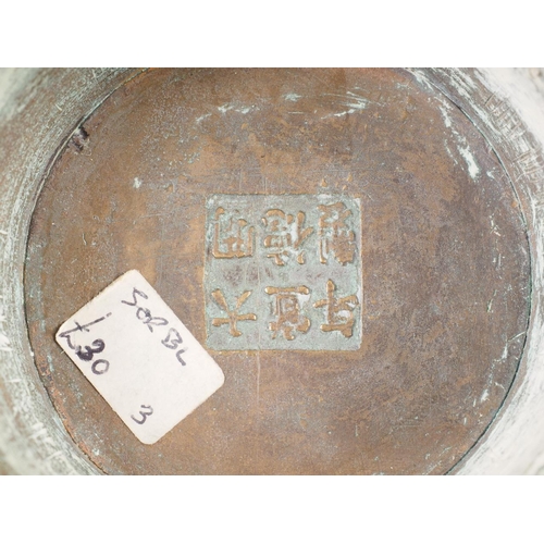 91 - A Chinese brass two-handled censer or archaic design with carved hardwood cover, six-character mark ... 