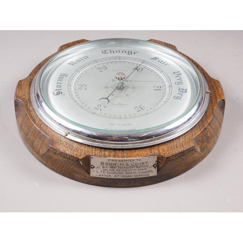 99 - An aneroid barometer, by Shortland Smiths, in oak case, 10 1/2