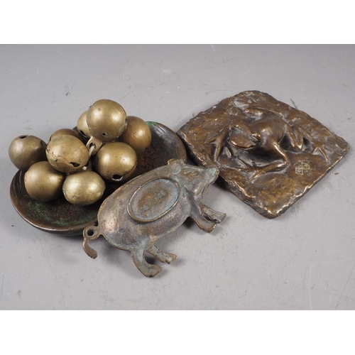 121 - A bronze dish, decorated as a swan, a square bronze paperweight, moulded as a frog, a brass pig dish... 