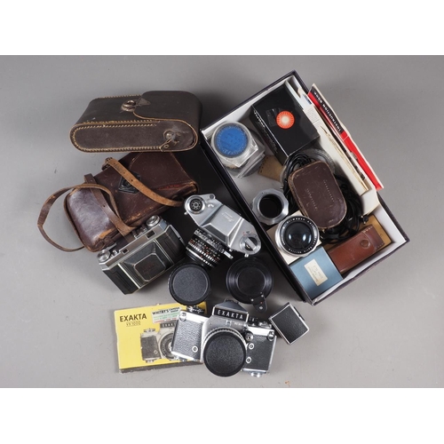 98 - An Exa Exakta camera, a Kodak Retina II camera and various other cameras and accessories