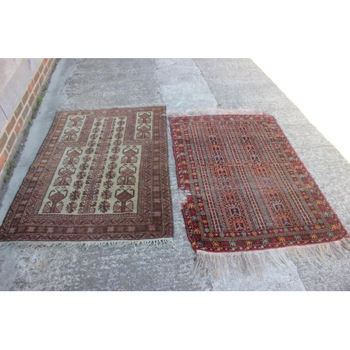 542 - A Middle Eastern prayer rug with geometric designs and star design borders, in shades of natural pin... 