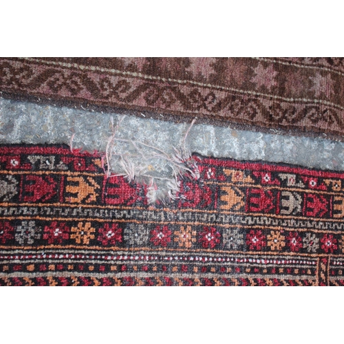 542 - A Middle Eastern prayer rug with geometric designs and star design borders, in shades of natural pin... 