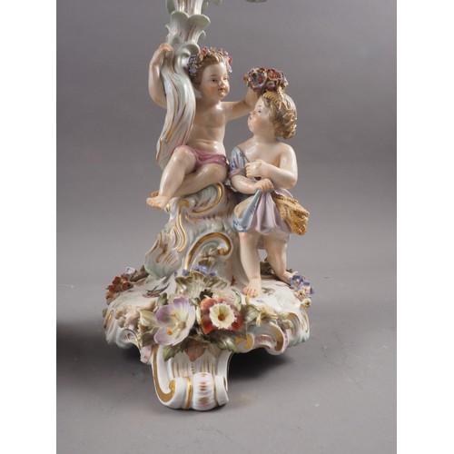 26 - A pair late 19th century Meissen three-branch candelabra with followers of Bacchus decoration, 13 1/... 