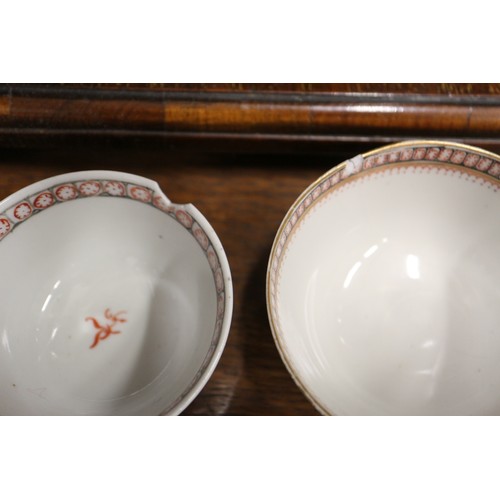 69 - Four Chinese tea bowls, a Canton teacup, a pair of blanc de Chine Dogs of Fo, 8