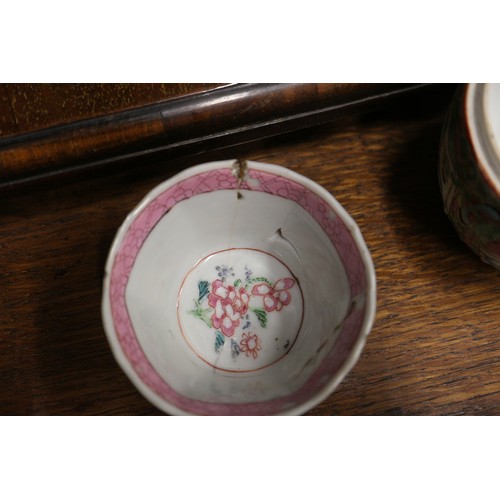 69 - Four Chinese tea bowls, a Canton teacup, a pair of blanc de Chine Dogs of Fo, 8