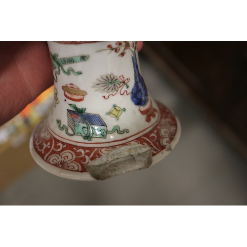 69 - Four Chinese tea bowls, a Canton teacup, a pair of blanc de Chine Dogs of Fo, 8