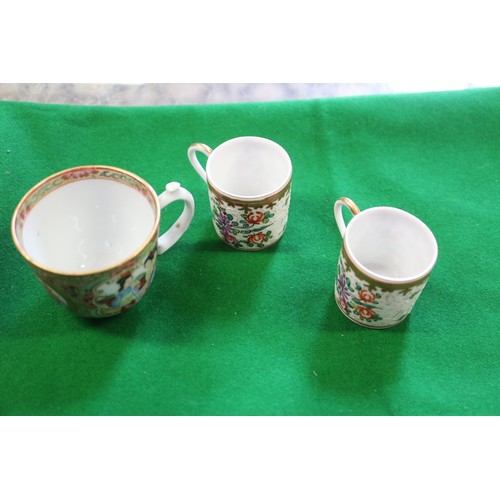 69 - Four Chinese tea bowls, a Canton teacup, a pair of blanc de Chine Dogs of Fo, 8