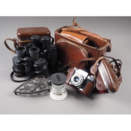 115 - A pair of Pentax 10x50 binoculars, one other pair of binoculars, a Conta flex camera, a telephoto le... 