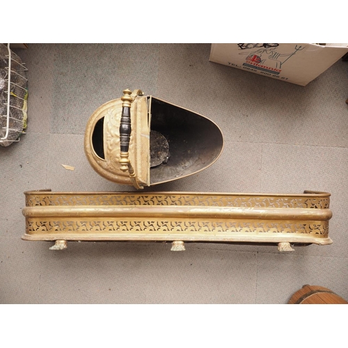 140 - A 19th century pierced brass fender curb, 47