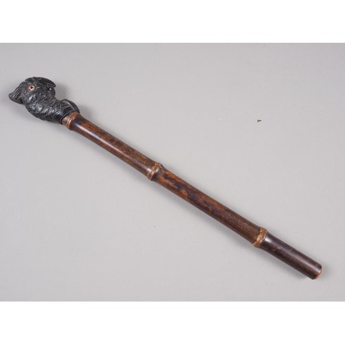 162 - An Edwardian bamboo and carved ebony parasol handle, formed as a parrot