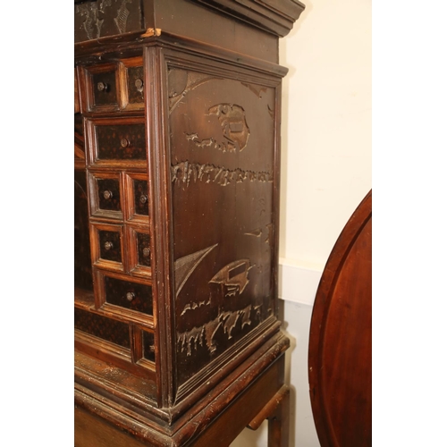 402 - An 18th century Continental walnut and decorated cabinet of drawers, with pull out central cupboard ... 