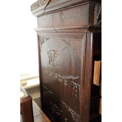 402 - An 18th century Continental walnut and decorated cabinet of drawers, with pull out central cupboard ... 