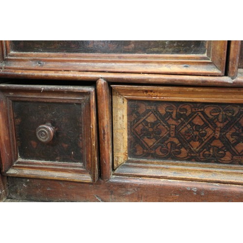 402 - An 18th century Continental walnut and decorated cabinet of drawers, with pull out central cupboard ... 