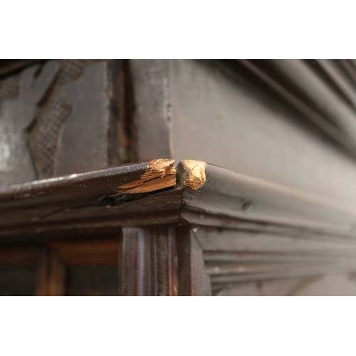 402 - An 18th century Continental walnut and decorated cabinet of drawers, with pull out central cupboard ... 