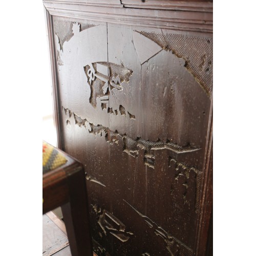 402 - An 18th century Continental walnut and decorated cabinet of drawers, with pull out central cupboard ... 