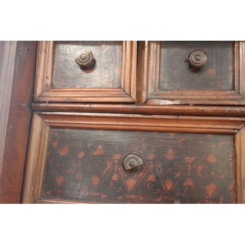 402 - An 18th century Continental walnut and decorated cabinet of drawers, with pull out central cupboard ... 