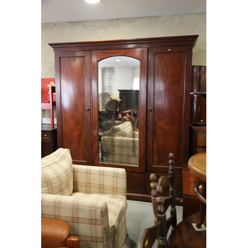 409 - A Holland and Sons 19th century figured mahogany linen press/wardrobe enclosed mirror door and two p... 